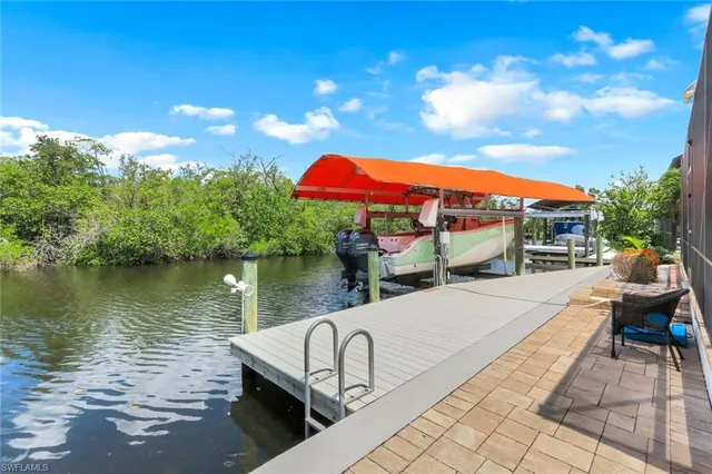 a view of swimming pool with a patio