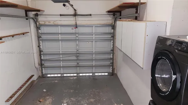 a bathroom with a sink and vanity