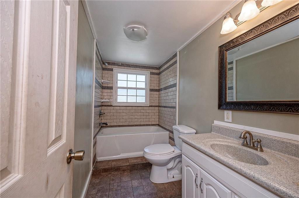 324 Winter Road New Castle, PA 16101 - Photo 17 of 32 Upstairs Bathroom with tub and shower