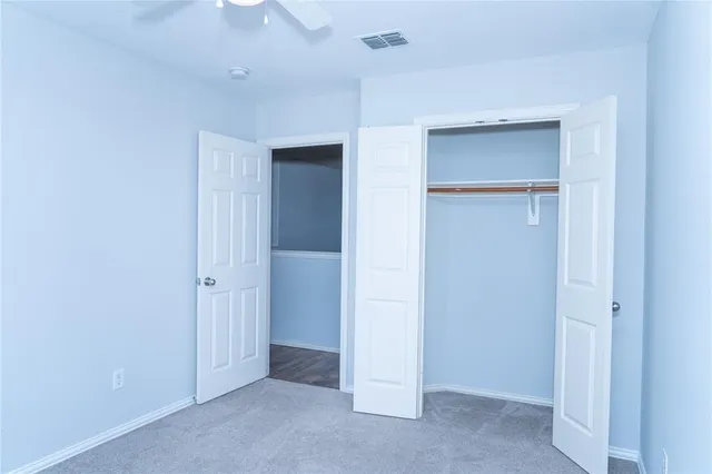 an empty room with closet
