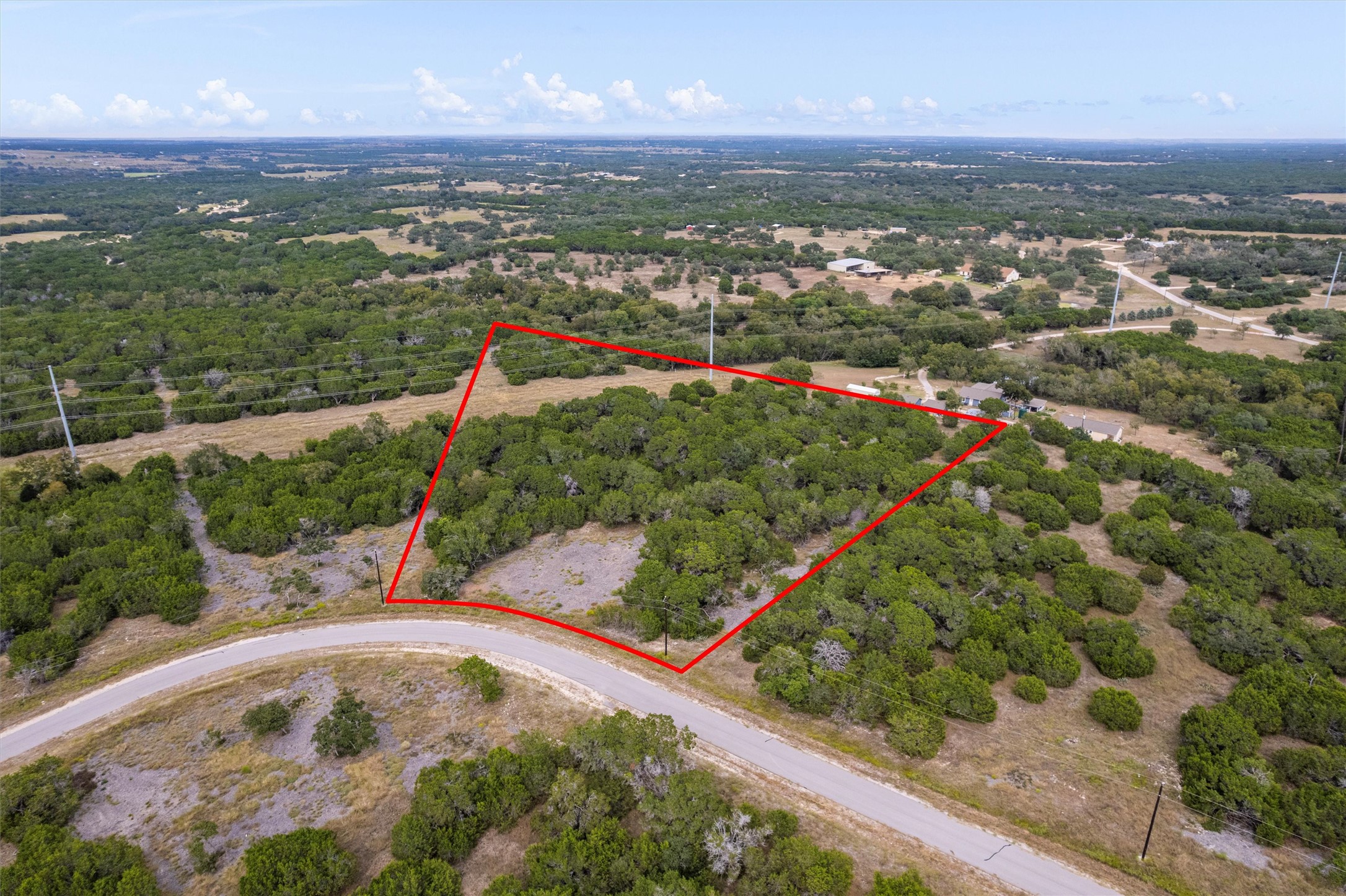 Overview of rural landscape featuring property boundaries highlighted