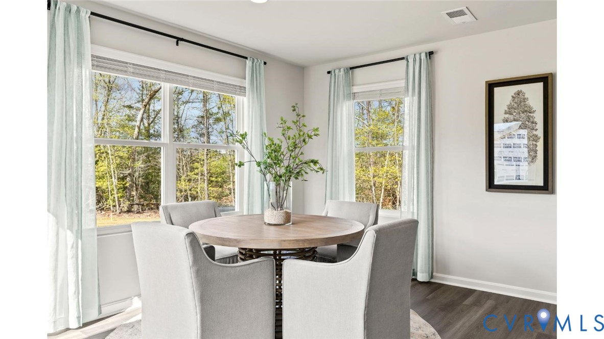 7731 Arbor Marsh Terrace New Kent, VA 23124 - Photo 13 of 37 a view of a room with a window and dining area