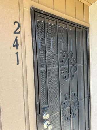 a bathroom with a shower and a mirror