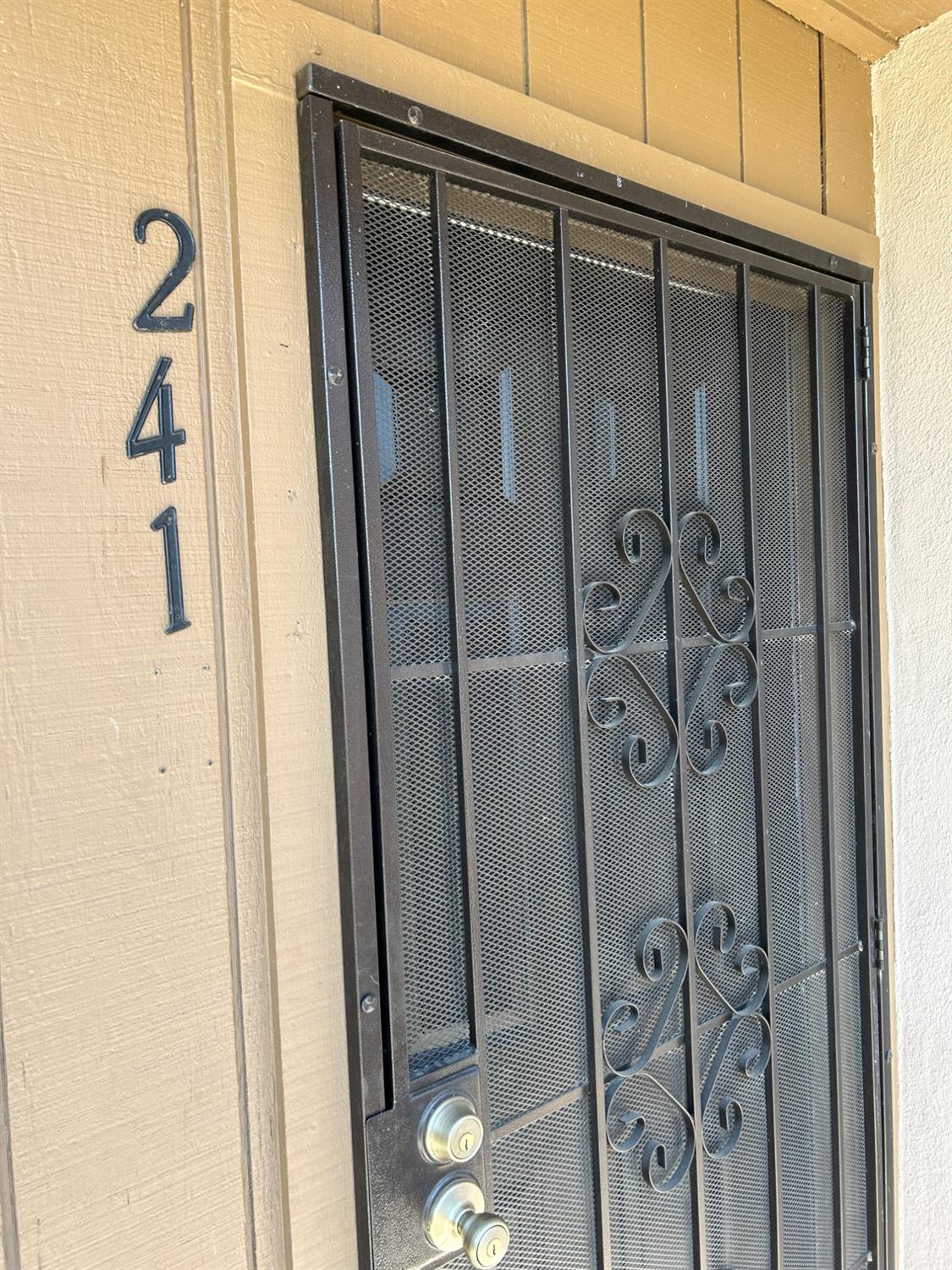 2900 Andre Lane, Unit 241 Turlock, CA 95382 - Photo 4 of 24 a bathroom with a shower and a mirror