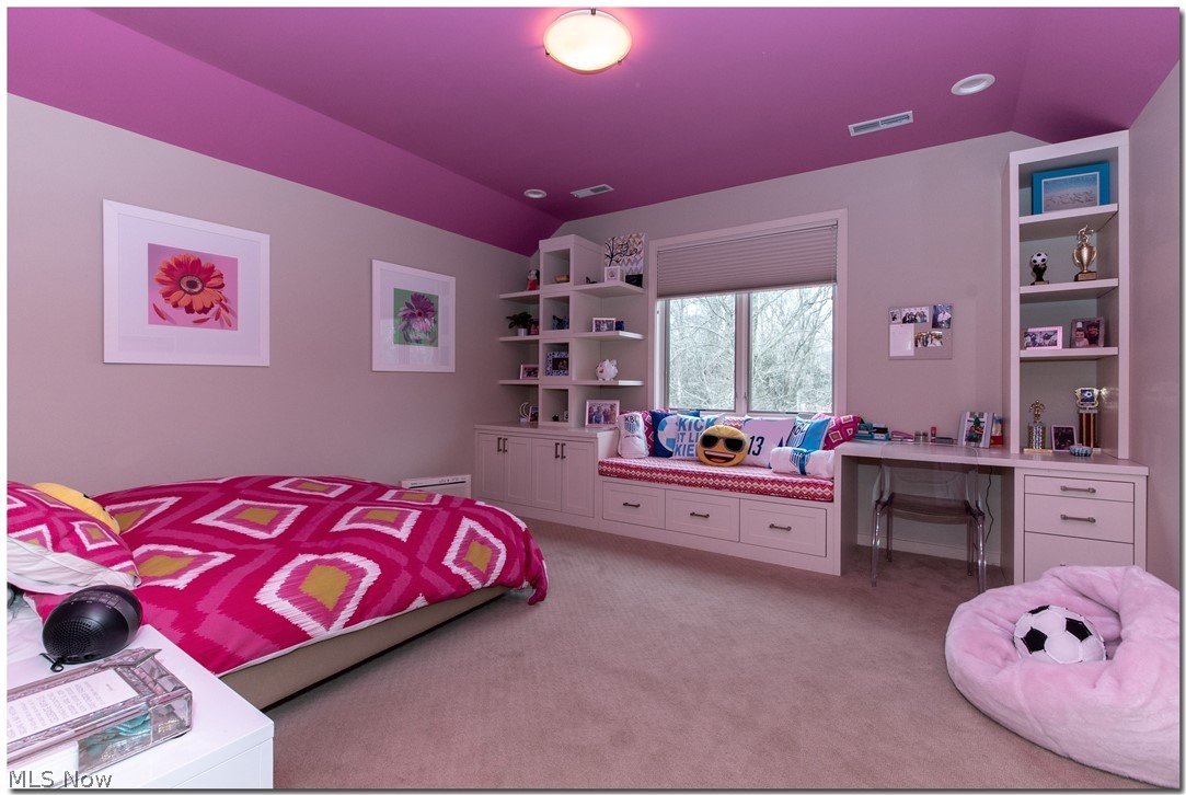 29600 Edgedale Road Cleveland, OH 44124 - Photo 23 of 31 With a wall of built-ins, a window seat and desk this colorful bedroom is functional and fun!!