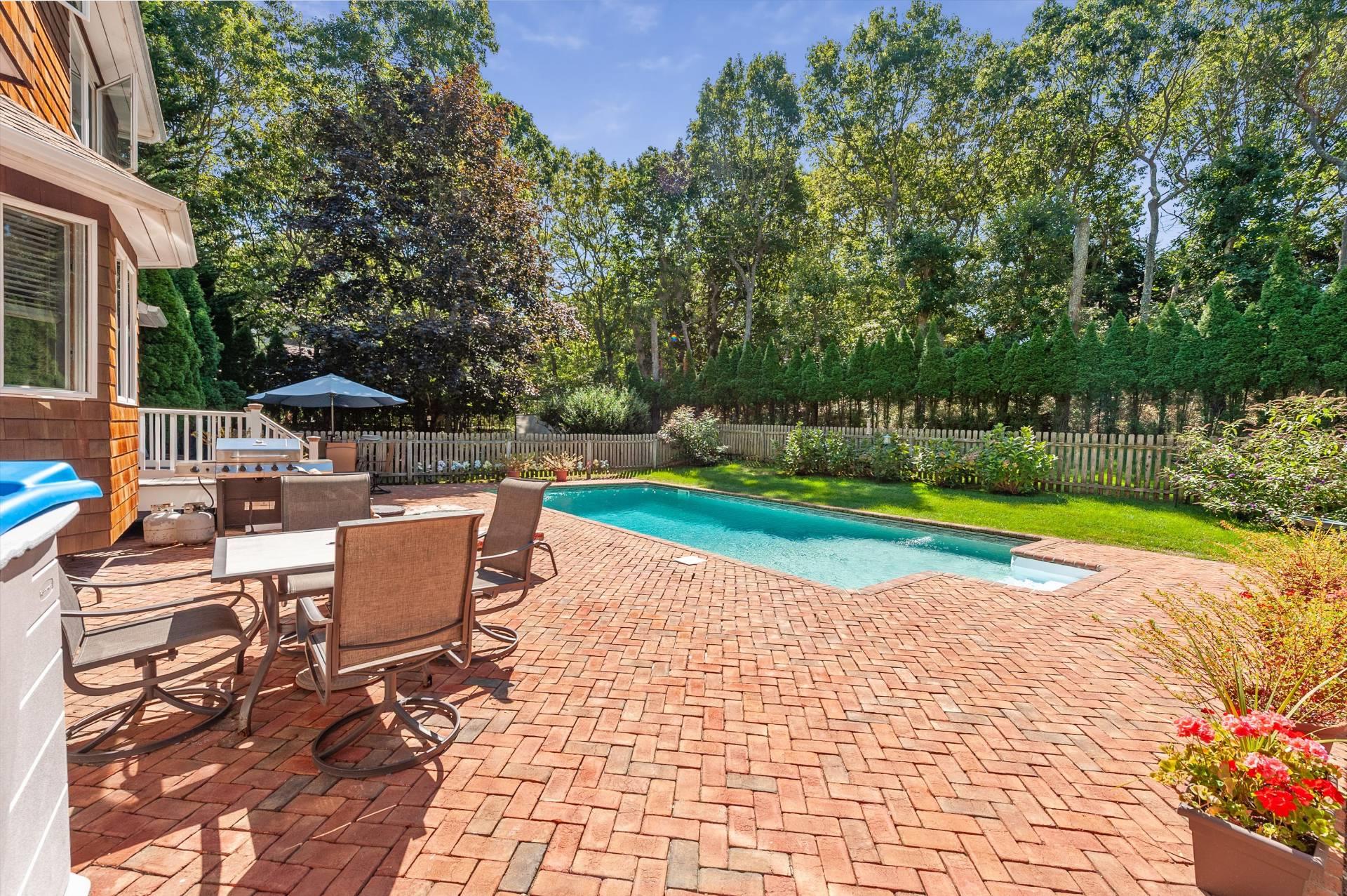 67 Straight Path Southampton, NY 11968 - Photo 19 of 23 View of pool featuring a patio, a fenced backyard, and outdoor dining space
