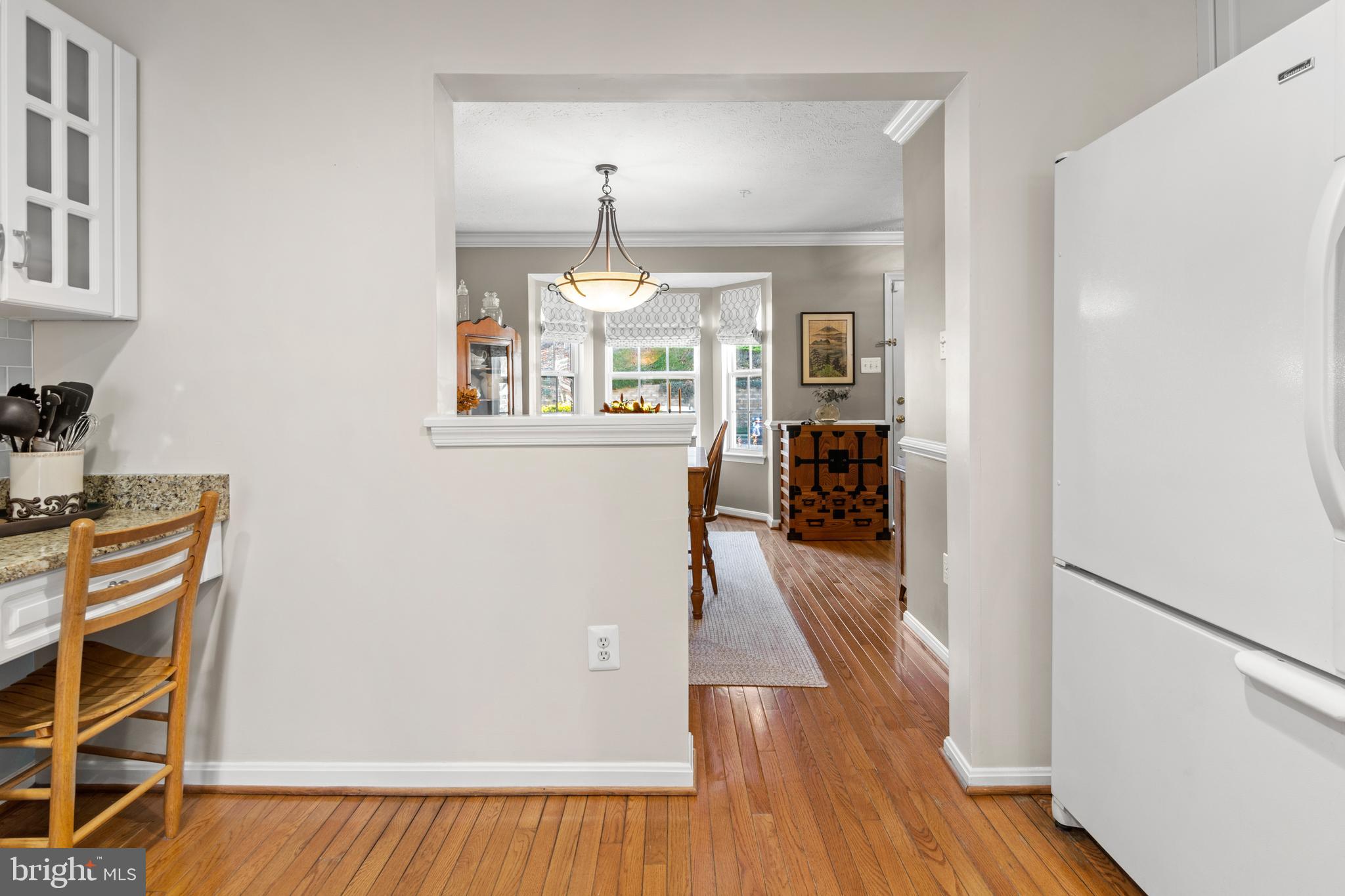 1447 Falcon Nest Court, Unit 45 Arnold, MD 21012 - Photo 18 of 58 a view of a living room with furniture and wooden floor