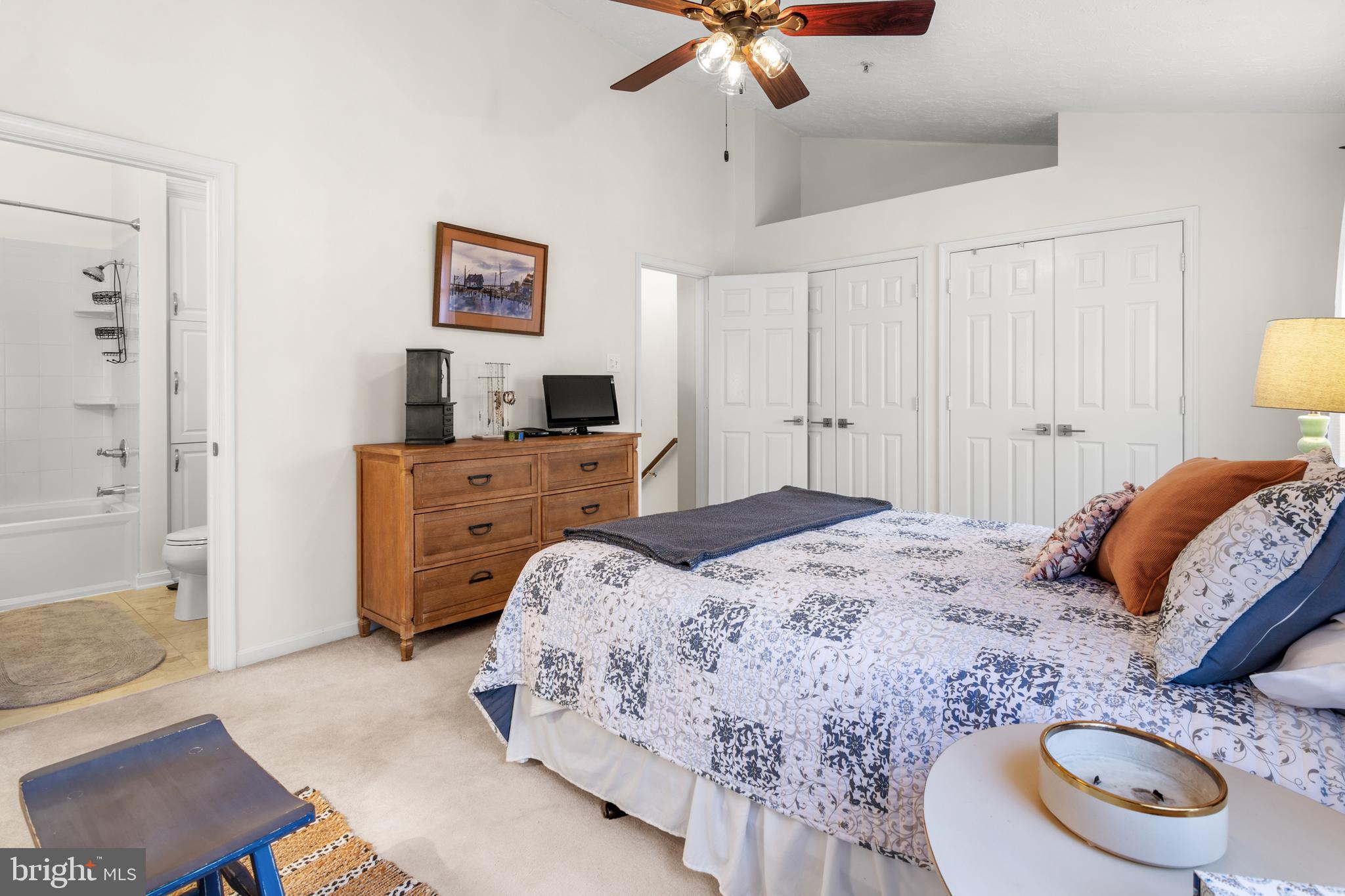 1447 Falcon Nest Court, Unit 45 Arnold, MD 21012 - Photo 37 of 58 a bedroom with a bed and a chair