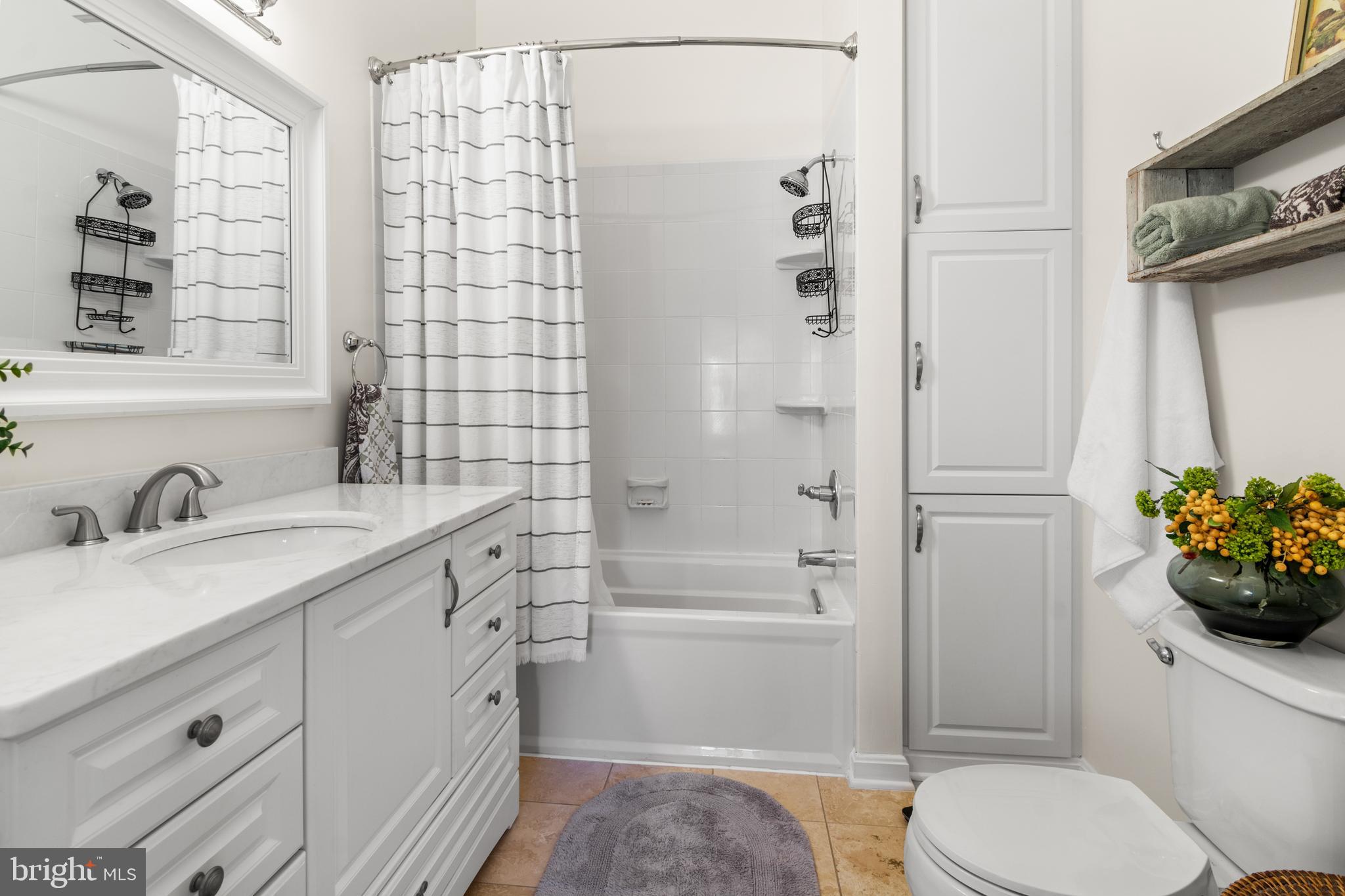 1447 Falcon Nest Court, Unit 45 Arnold, MD 21012 - Photo 38 of 58 a bathroom with a sink toilet and shower