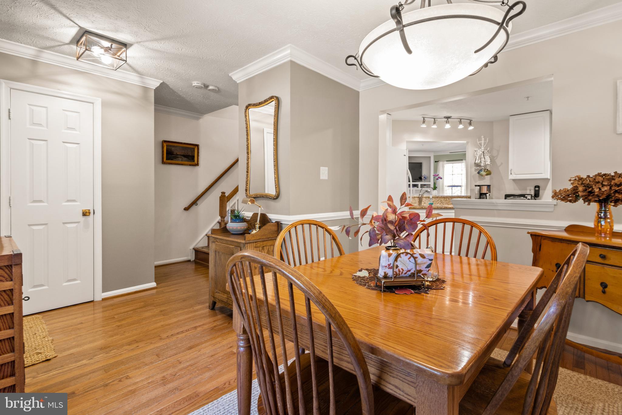 1447 Falcon Nest Court, Unit 45 Arnold, MD 21012 - Photo 9 of 58 a view of a dining room with furniture