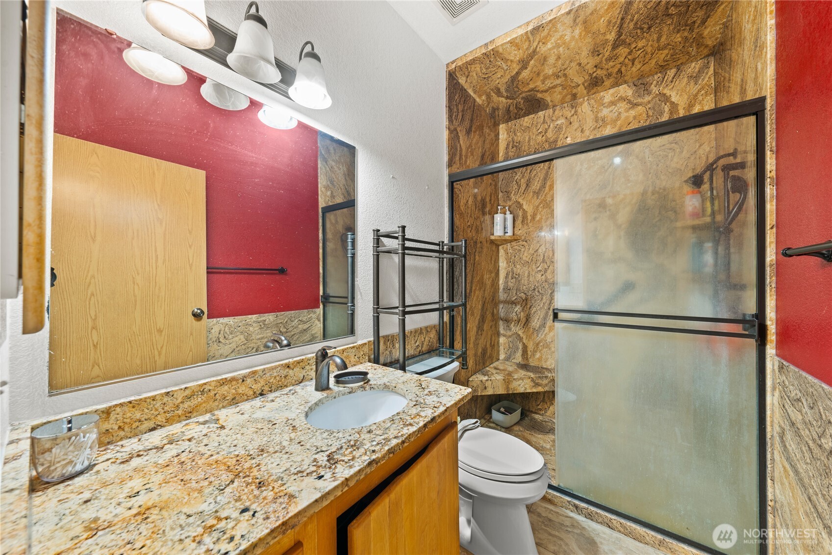 2211 Sielaff Road Othello, WA 99344 - Photo 26 of 37 a bathroom with a granite countertop sink toilet and shower