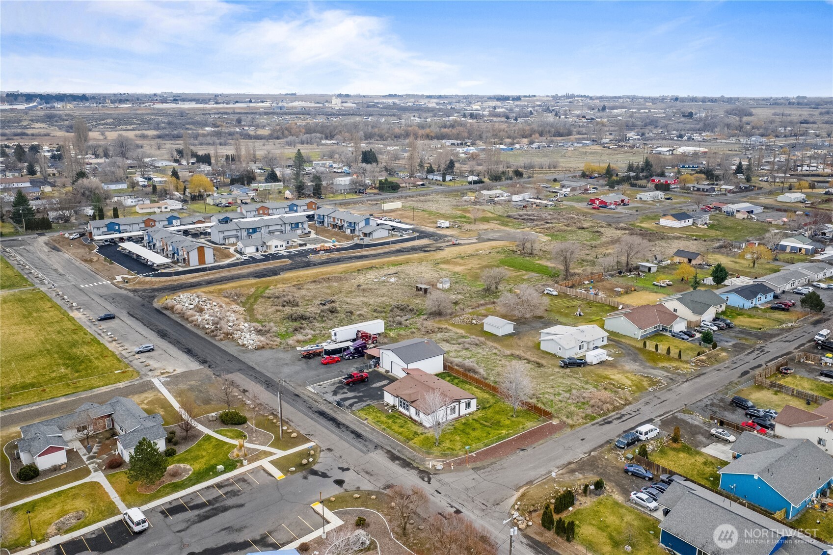 2211 Sielaff Road Othello, WA 99344 - Photo 34 of 37 an aerial view of residential houses with outdoor space