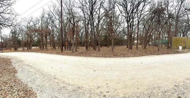 a view of snow on the side of the road