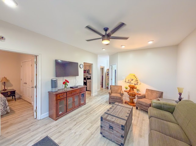 449 Miller Lane Goodspring, TN 38460 - Photo 15 of 20 a living room with furniture and a flat screen tv