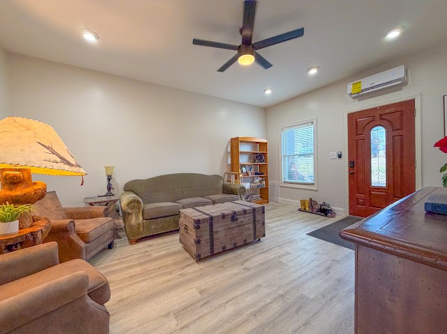 449 Miller Lane Goodspring, TN 38460 - Photo 2 of 20 a living room with furniture and a flat screen tv