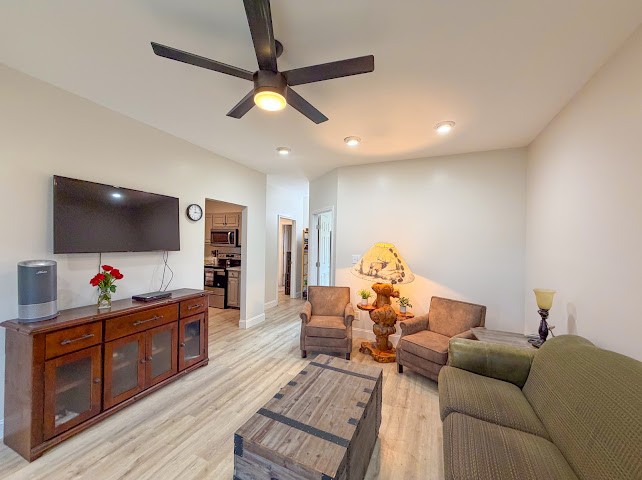 449 Miller Lane Goodspring, TN 38460 - Photo 5 of 20 a living room with furniture and a flat screen tv