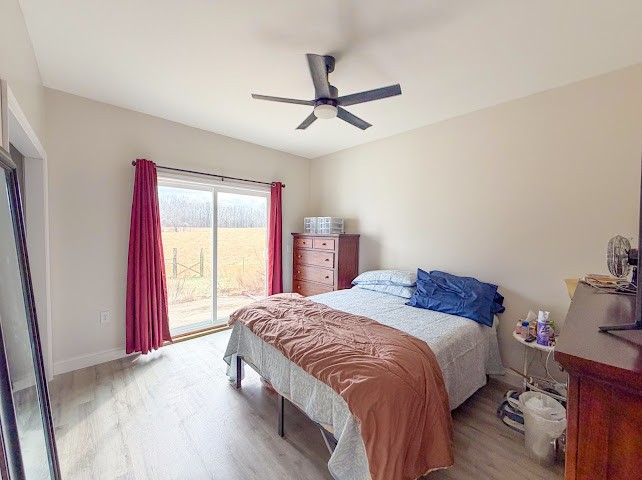 449 Miller Lane Goodspring, TN 38460 - Photo 10 of 20 a bedroom with a bed and a window
