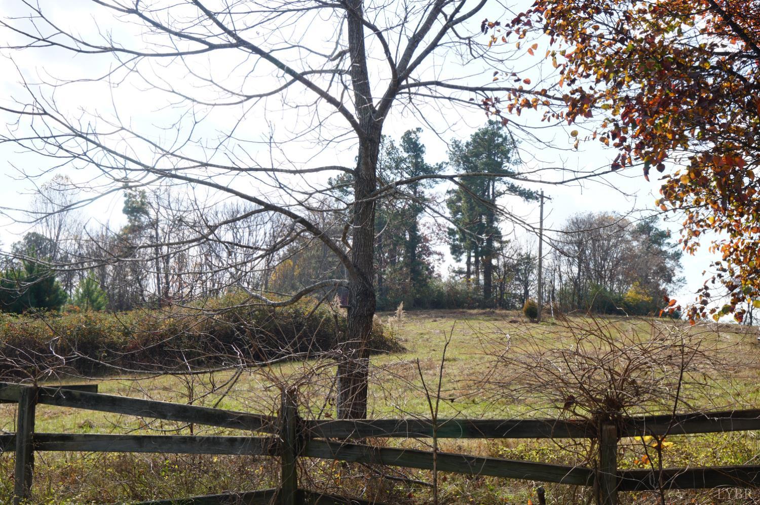 570 Old Well Road Phenix, VA 23959 - Photo 11 of 17 a view of a yard with trees