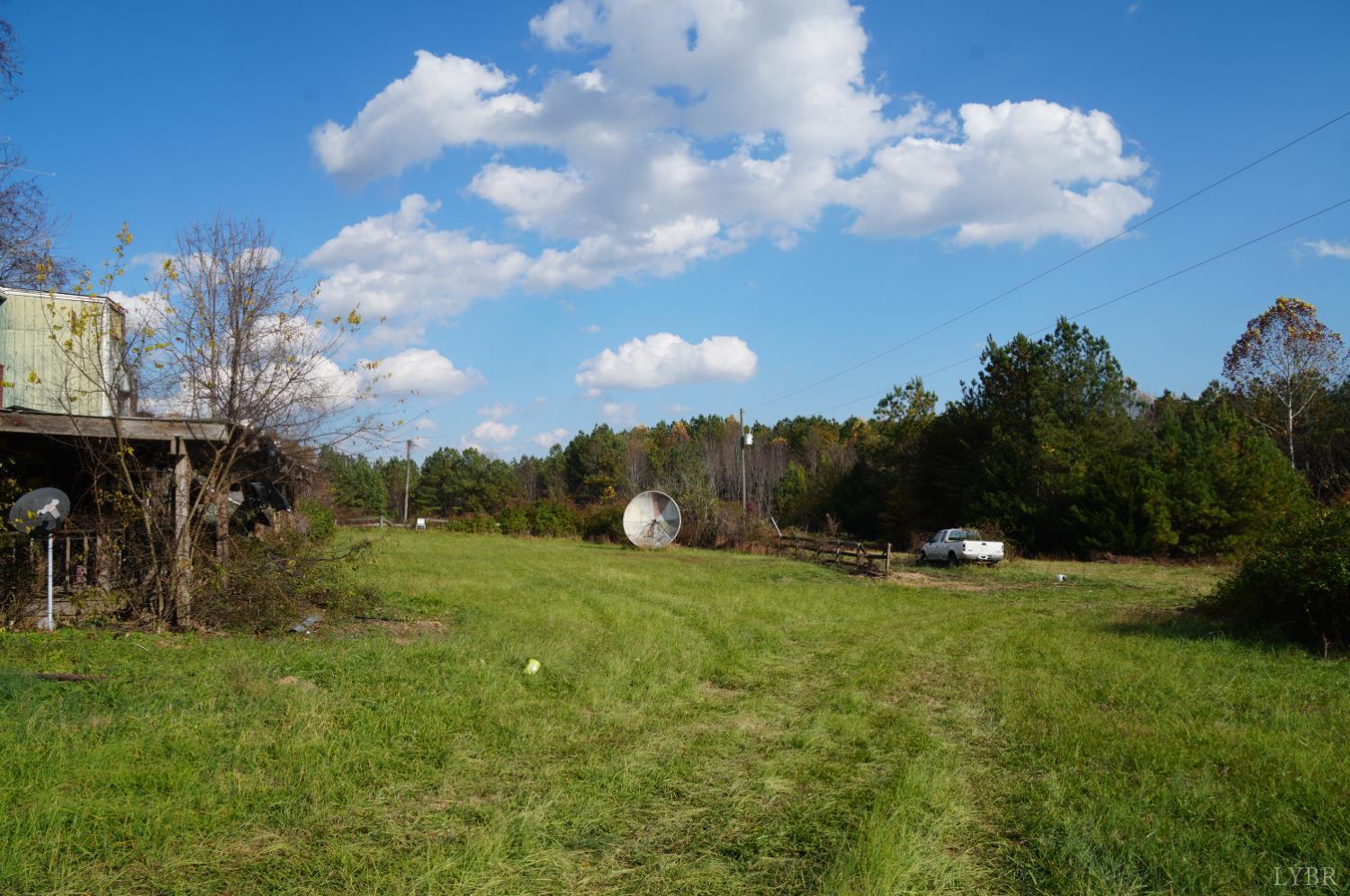 570 Old Well Road Phenix, VA 23959 - Photo 13 of 17 a view of an outdoor space and a yard