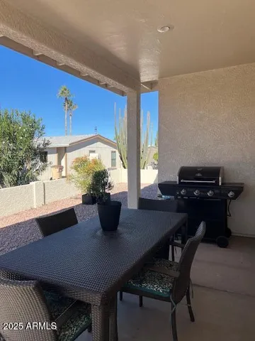 a view of a building with a yard