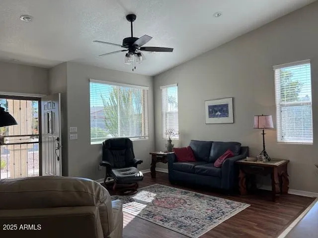 a living room with furniture and a window