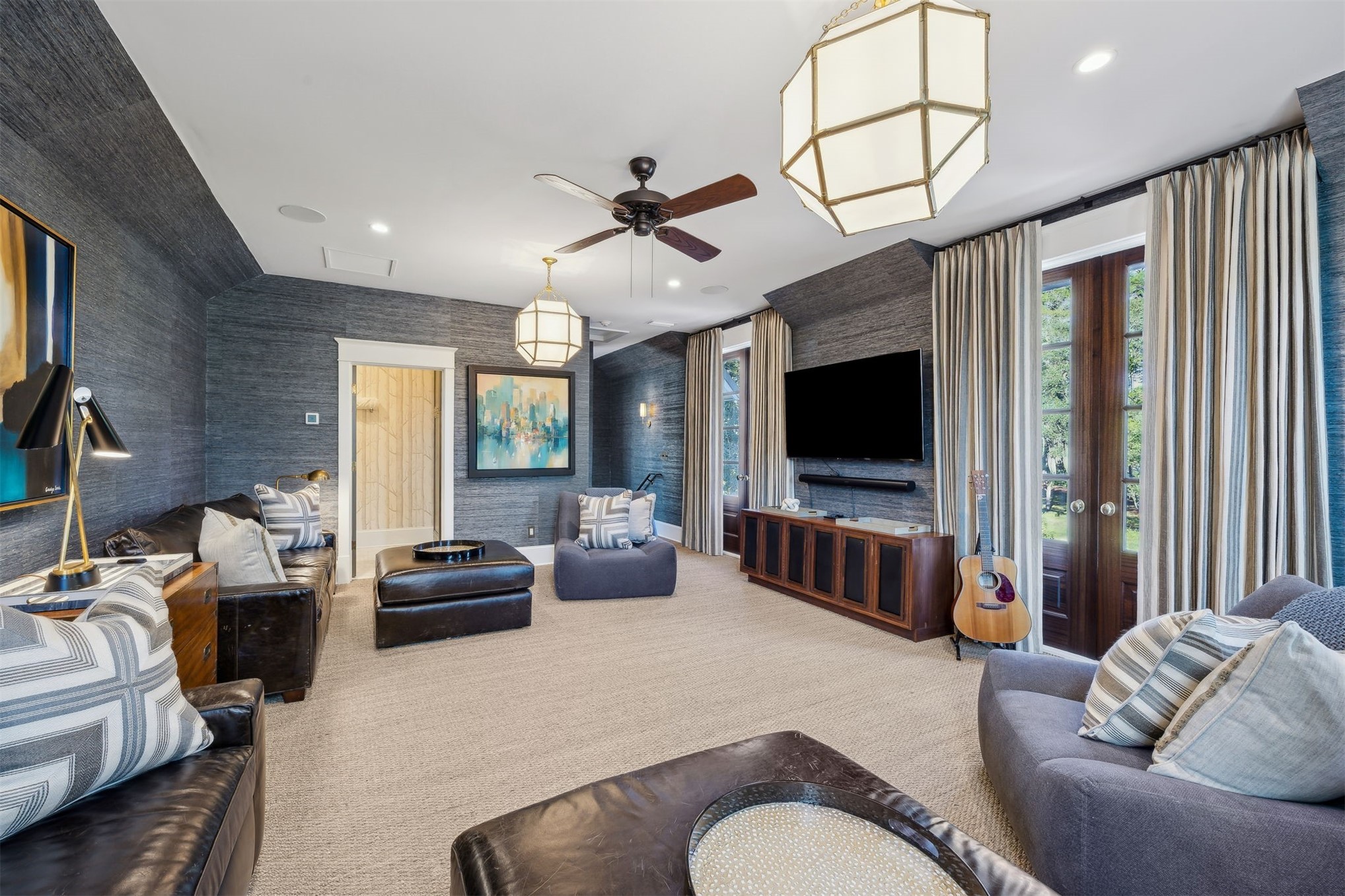 101 Broadbent Way Fernandina Beach, FL 32034 - Photo 16 of 29 a living room with furniture ceiling fan and a flat screen tv
