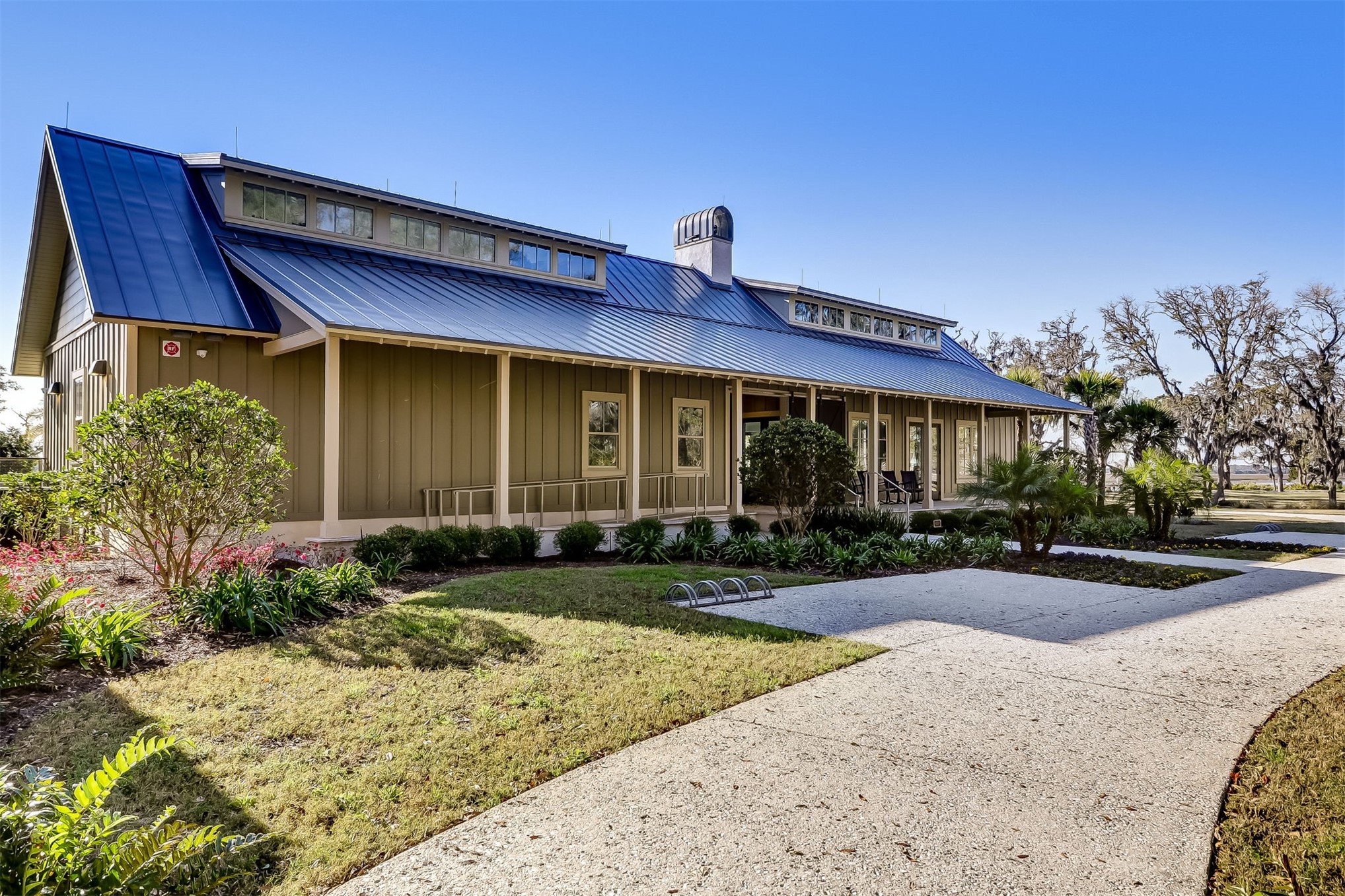 101 Broadbent Way Fernandina Beach, FL 32034 - Photo 21 of 29 a front view of a house with garden and porch