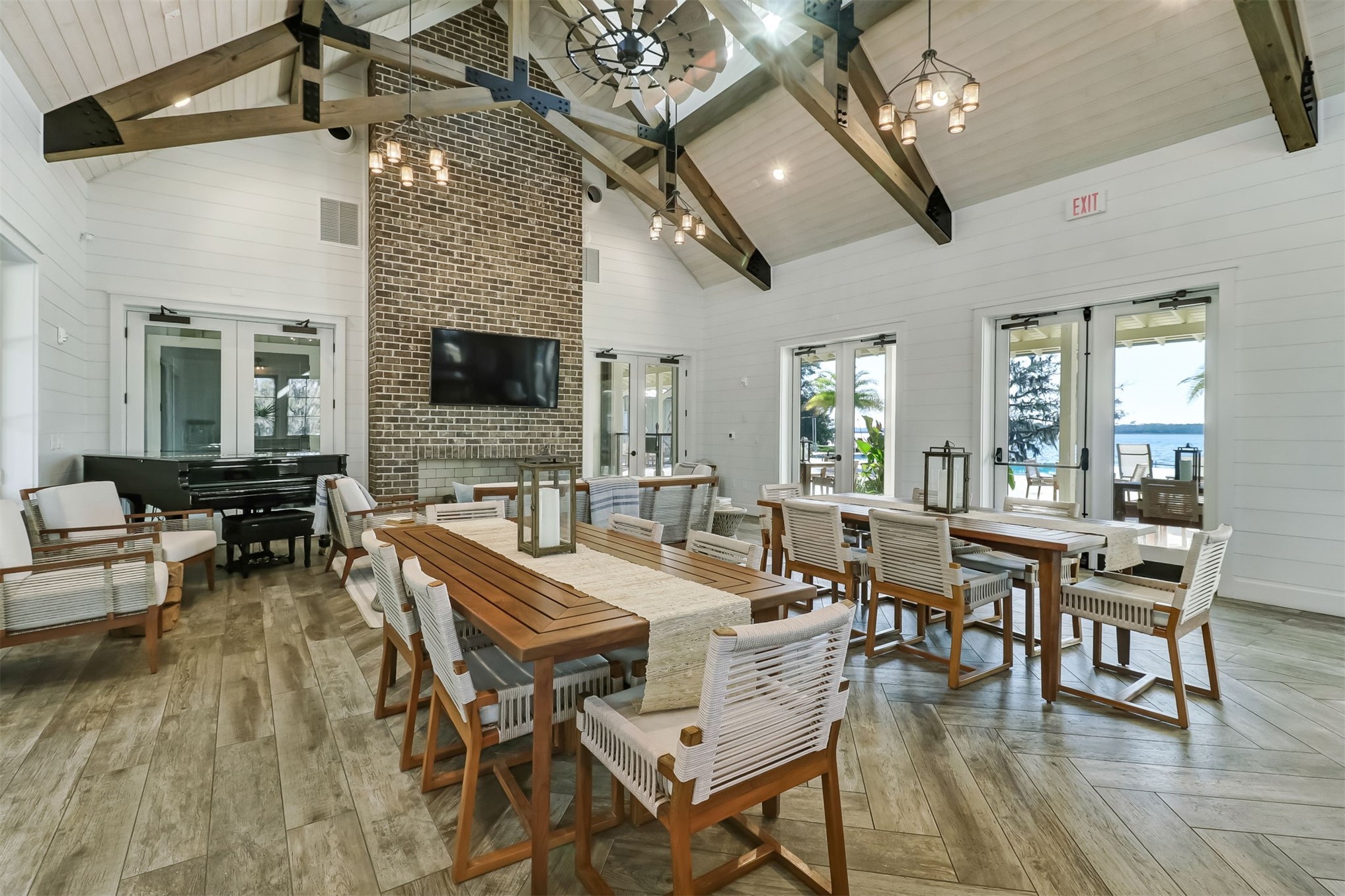 101 Broadbent Way Fernandina Beach, FL 32034 - Photo 25 of 29 a view of a dining room with furniture a chandelier and wooden floor