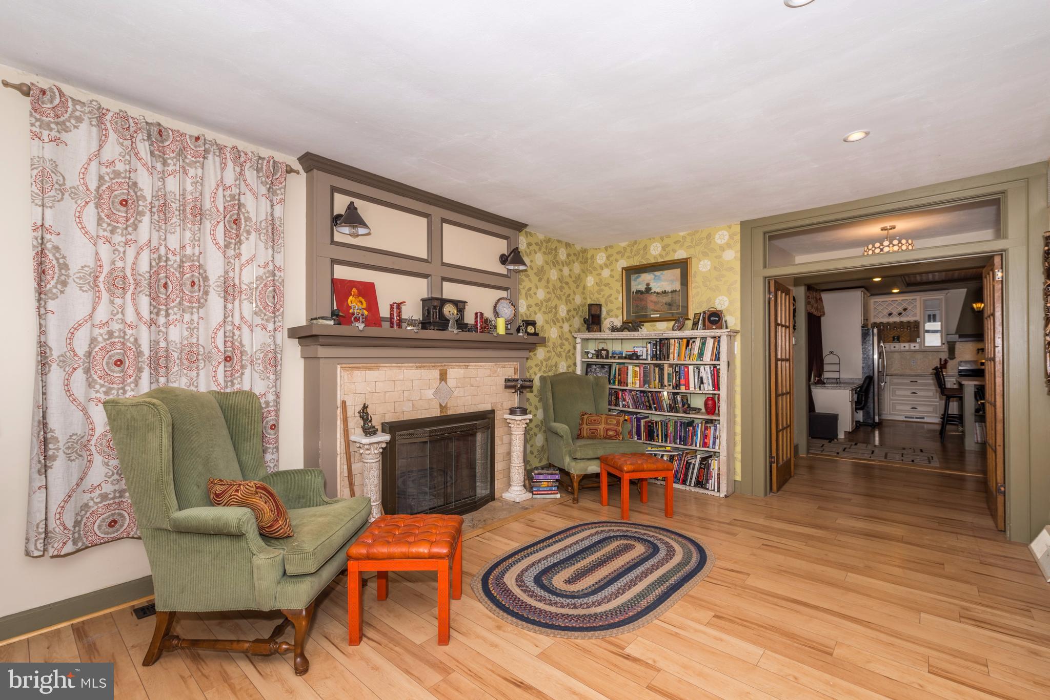61 Mayfield Street Dover, PA 17315 - Photo 12 of 61 a living room with furniture and a fireplace