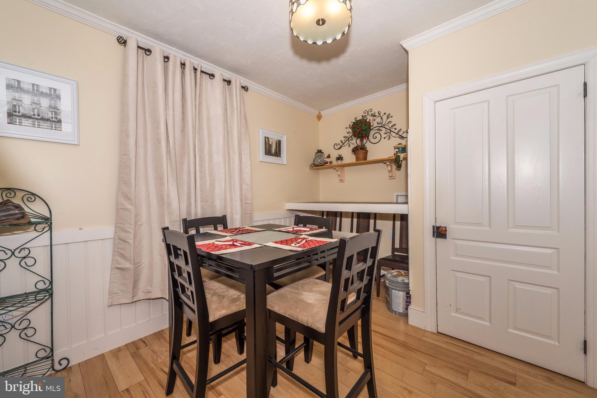 61 Mayfield Street Dover, PA 17315 - Photo 14 of 61 a view of a dining room with furniture and wooden floor