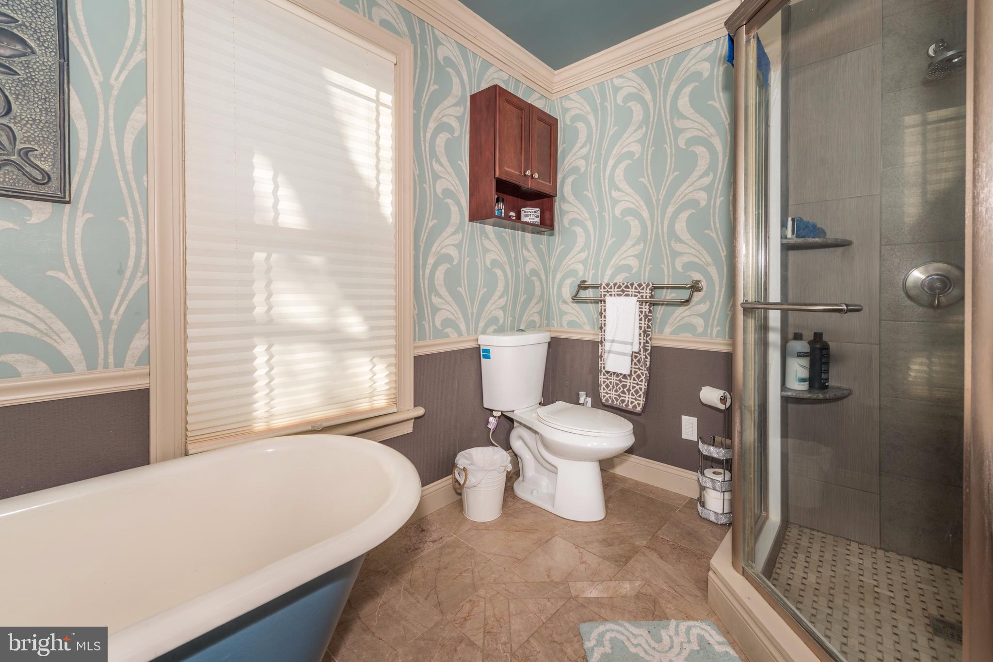 61 Mayfield Street Dover, PA 17315 - Photo 37 of 61 a living room with a toilet and a shower