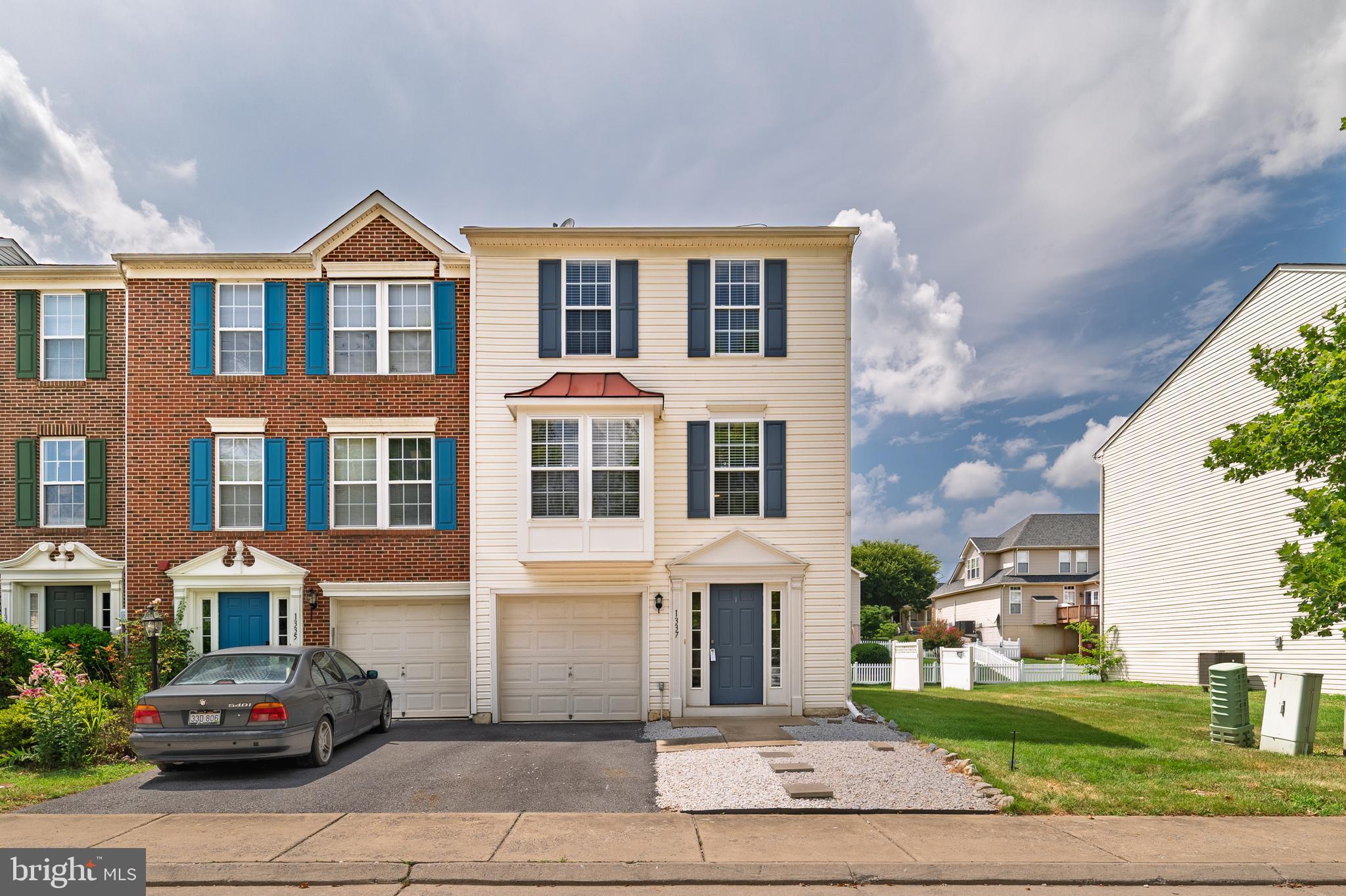 1337 Steed Street Ranson, WV 25438 - Photo 1 of 42 a front view of a residential houses with yard