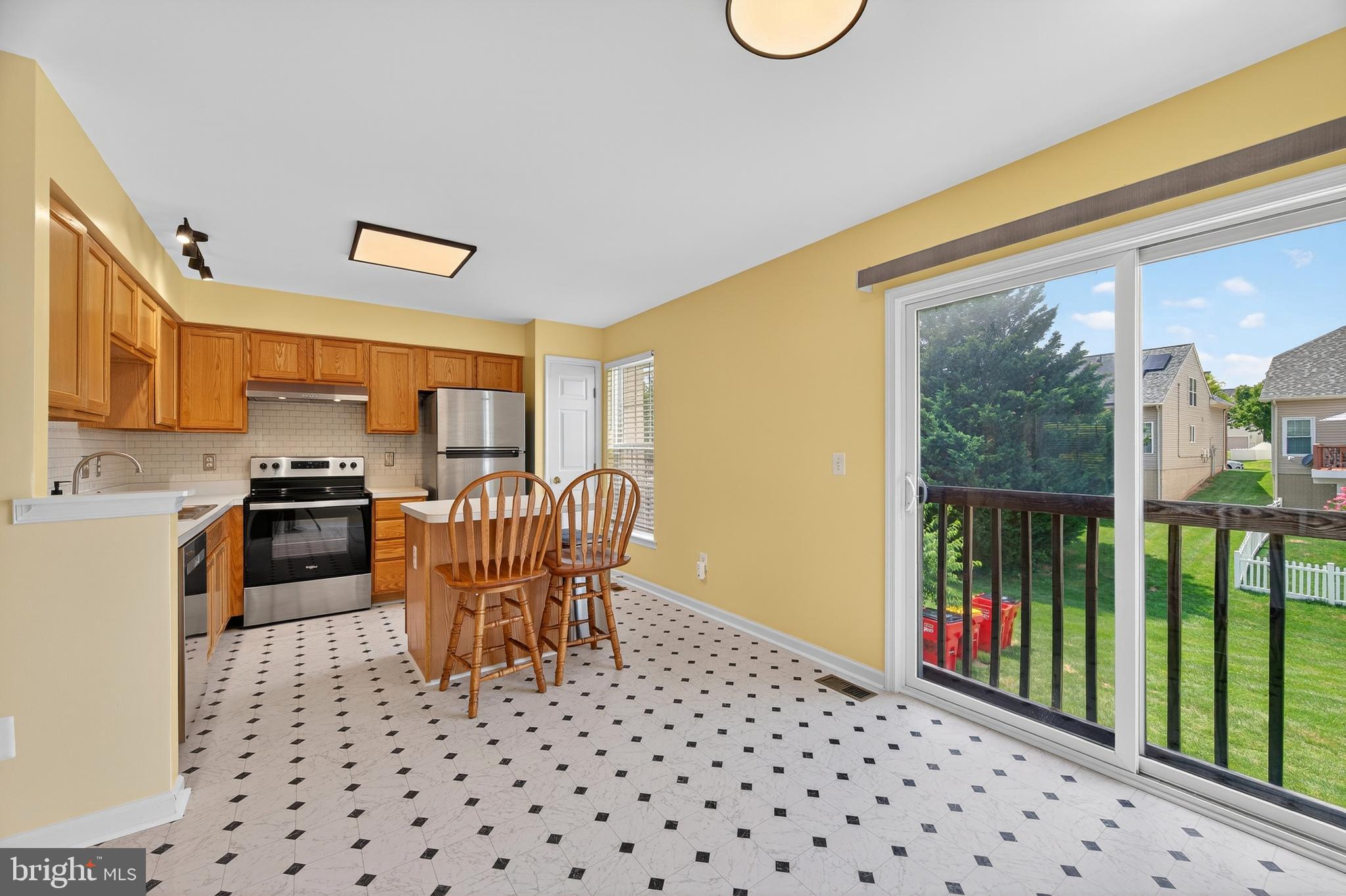1337 Steed Street Ranson, WV 25438 - Photo 18 of 42 a dining room with furniture a chandelier and window