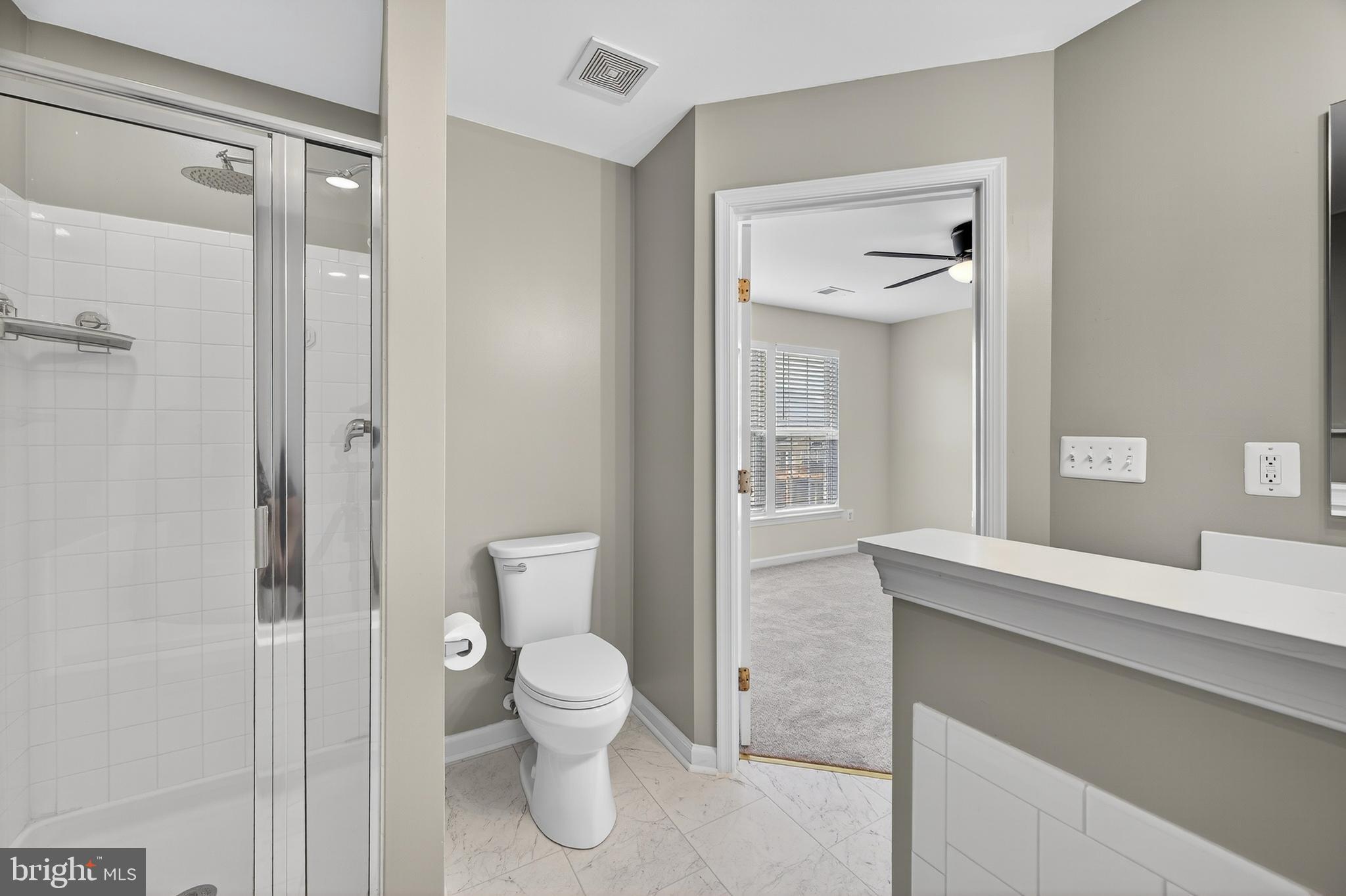 1337 Steed Street Ranson, WV 25438 - Photo 23 of 42 a bathroom with a toilet sink and shower