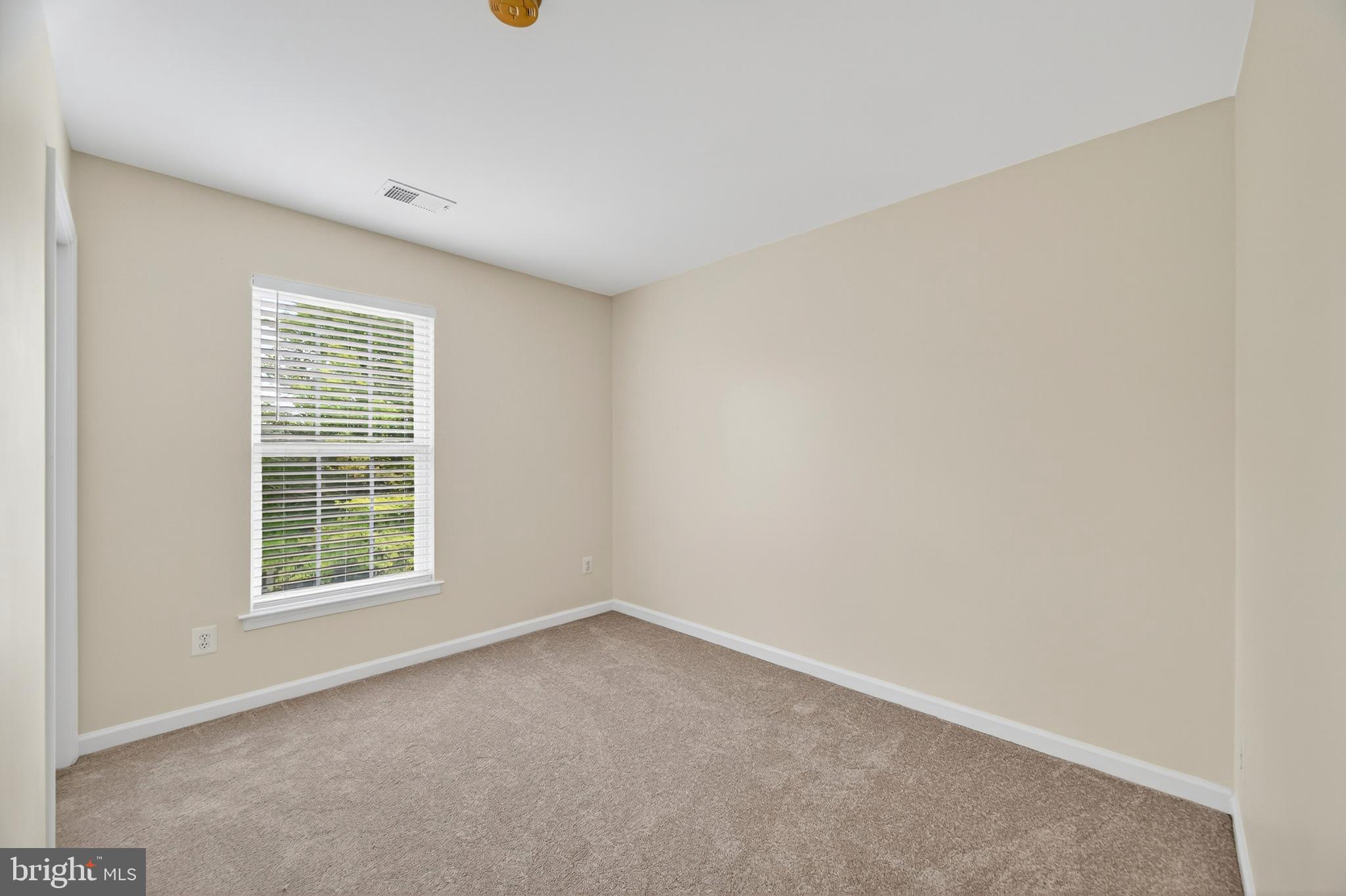 1337 Steed Street Ranson, WV 25438 - Photo 26 of 42 an empty room with windows