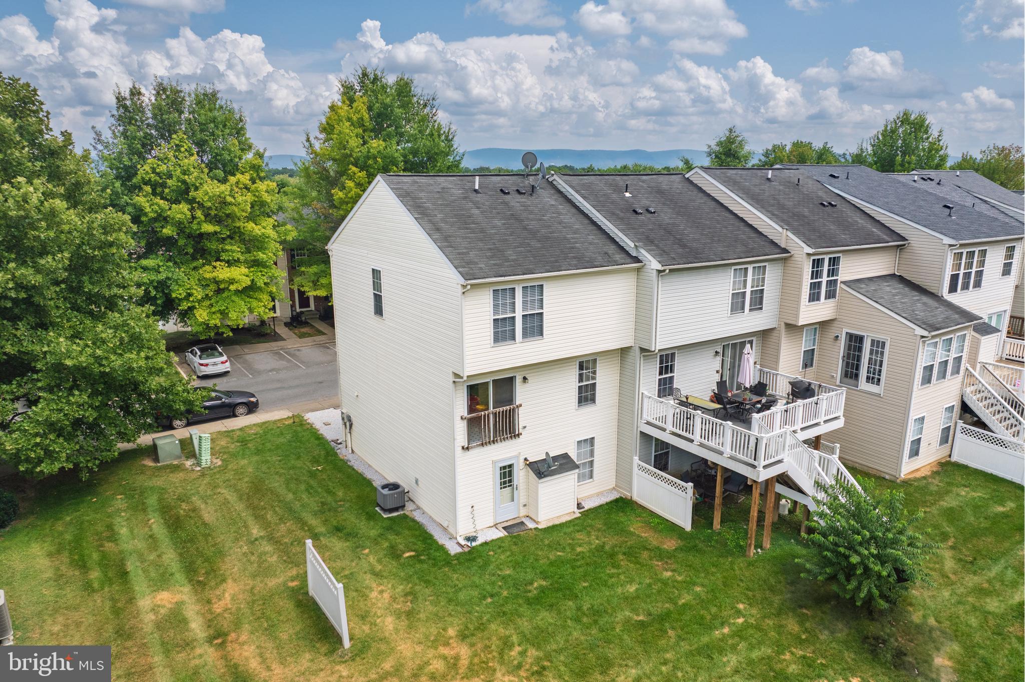 1337 Steed Street Ranson, WV 25438 - Photo 34 of 42 aerial view of a house with a yard and deck
