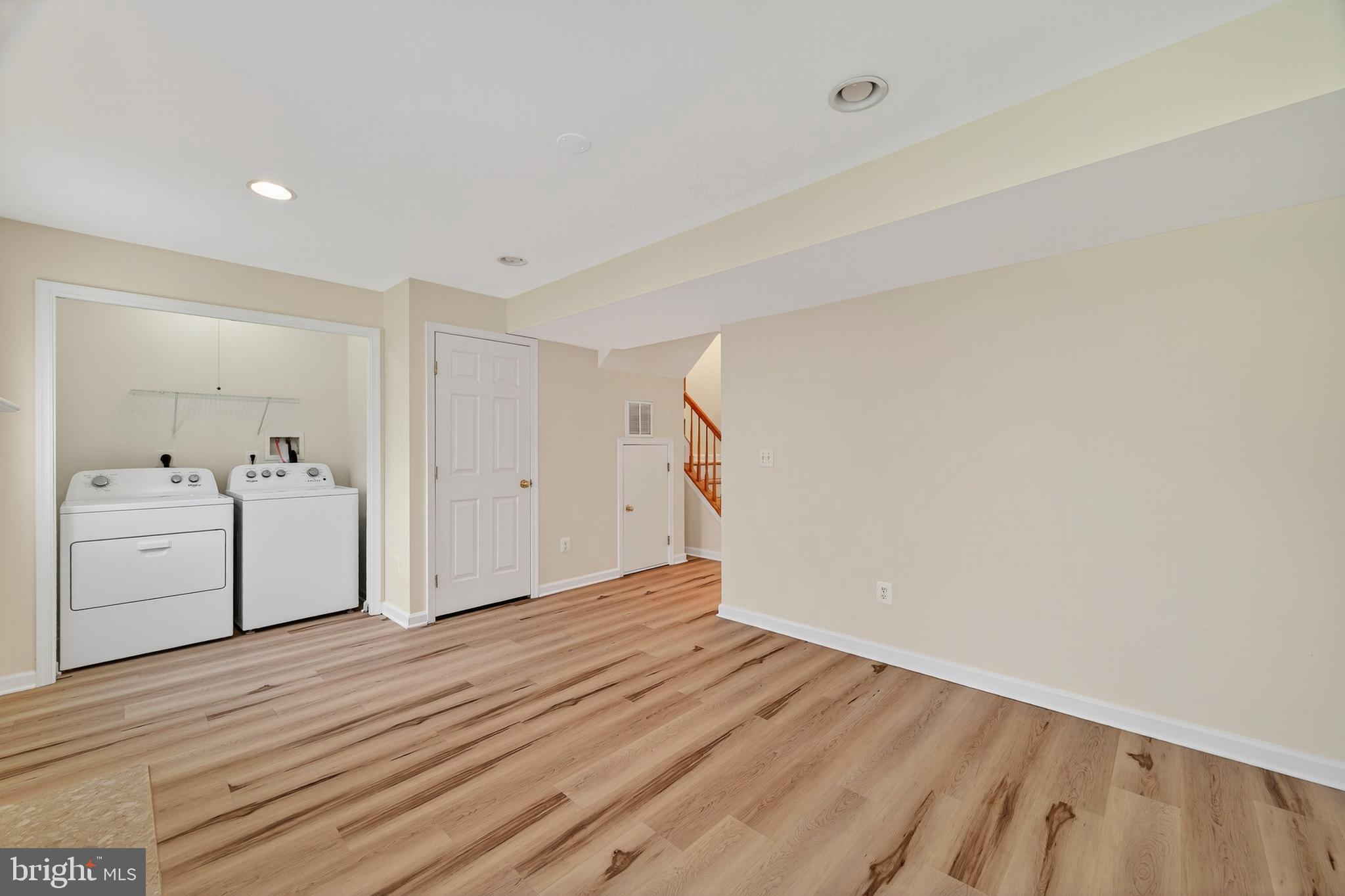 1337 Steed Street Ranson, WV 25438 - Photo 7 of 42 a view of a room with wooden floor and a sink