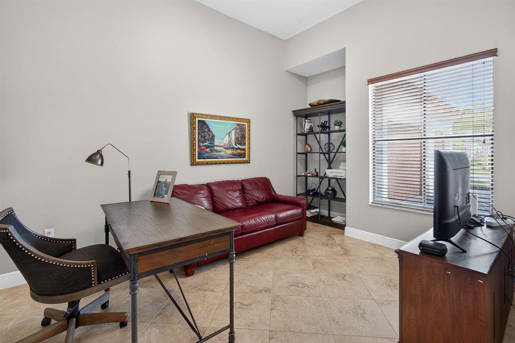5294 Ferrari Avenue Ave Maria, FL 34142 - Photo 19 of 42 a living room with furniture and a window