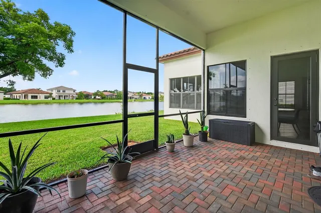 an aerial view of house with yard