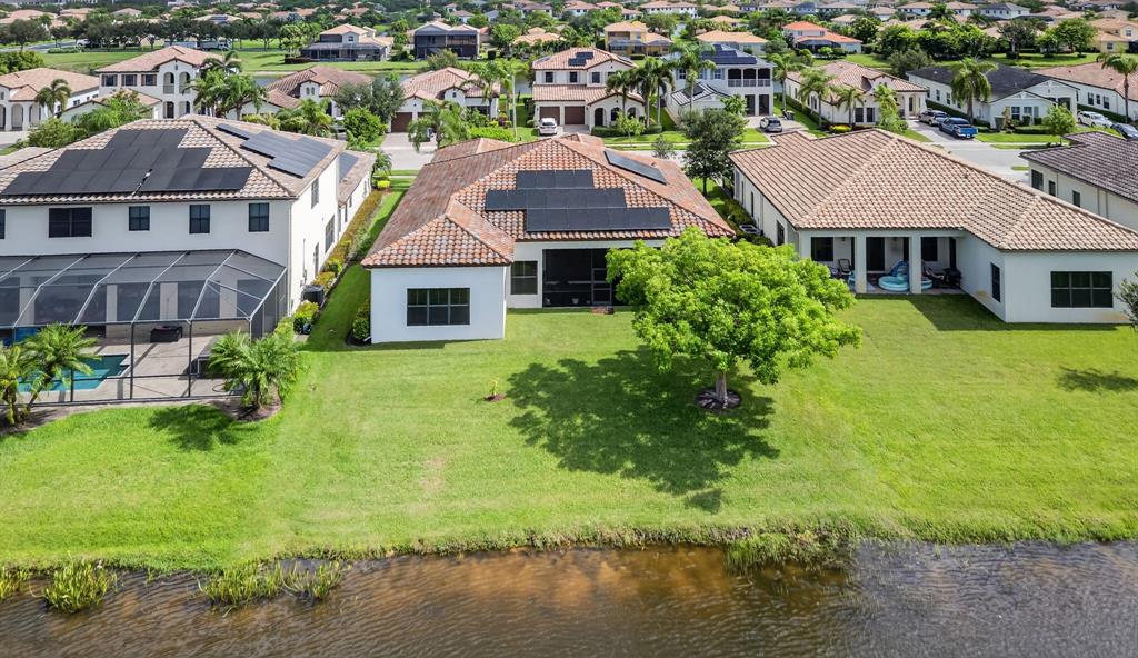 5294 Ferrari Avenue Ave Maria, FL 34142 - Photo 38 of 42 an aerial view of a house