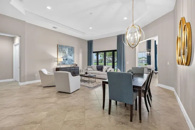 a view of a livingroom with furniture and window
