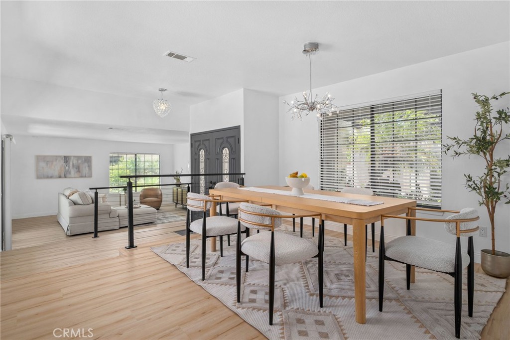 5087 Granada Court Rancho Cucamonga, CA 91737 - Photo 11 of 49 a view of a dining room with furniture window and outside view