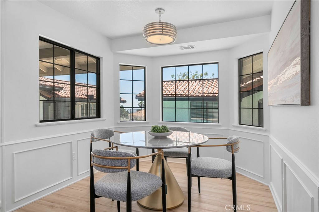 5087 Granada Court Rancho Cucamonga, CA 91737 - Photo 21 of 49 a dining room with furniture and window
