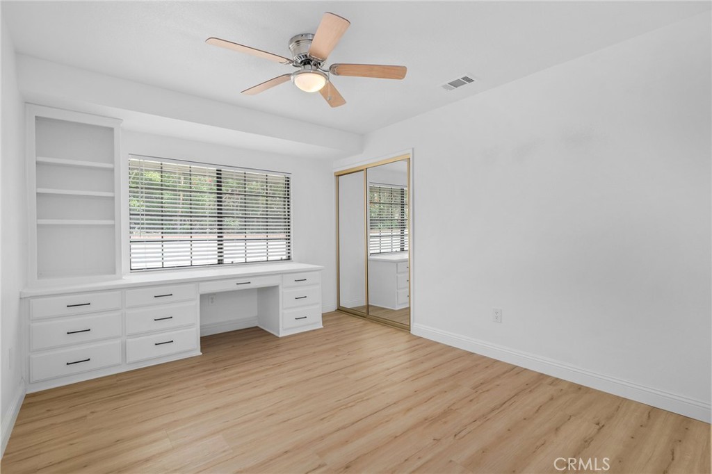 5087 Granada Court Rancho Cucamonga, CA 91737 - Photo 24 of 49 wooden floor in an empty room with a window