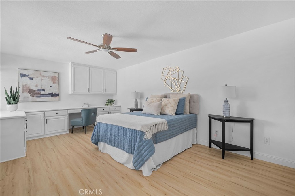 5087 Granada Court Rancho Cucamonga, CA 91737 - Photo 28 of 49 a bedroom with a bed and a desk
