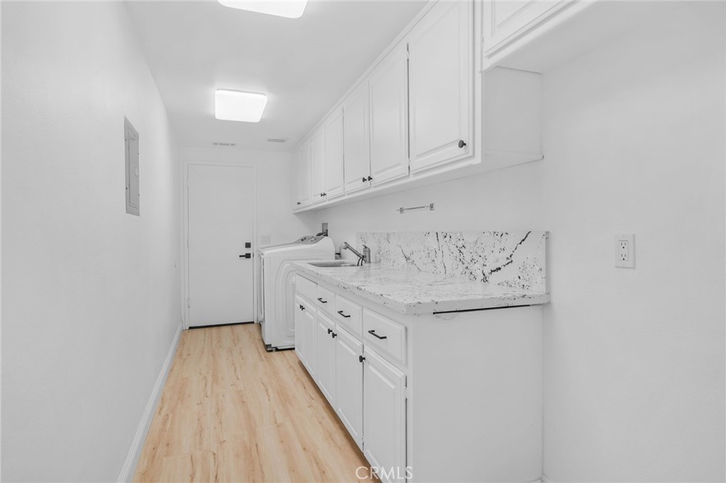 5087 Granada Court Rancho Cucamonga, CA 91737 - Photo 31 of 49 a room with storage and utility