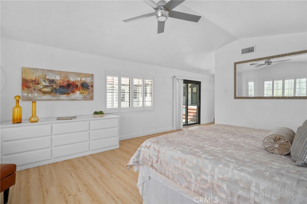 5087 Granada Court Rancho Cucamonga, CA 91737 - Photo 34 of 49 a bedroom with a large bed and a window