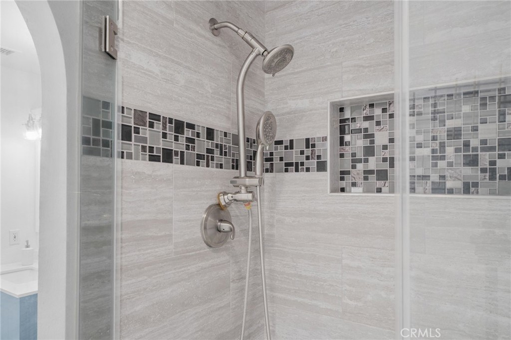 5087 Granada Court Rancho Cucamonga, CA 91737 - Photo 39 of 49 a bathroom with a shower
