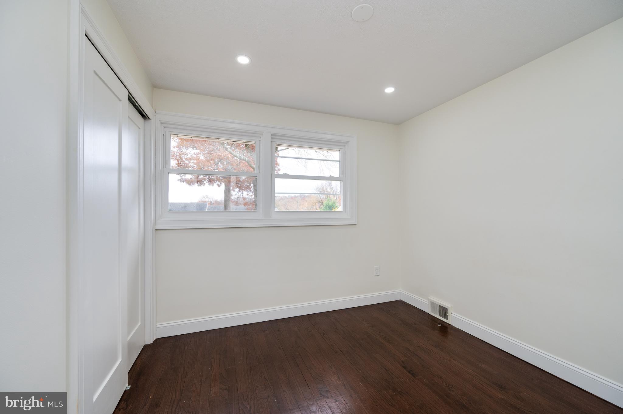 12 Vista Road Reading, PA 19610 - Photo 17 of 39 an empty room with wooden floor and windows