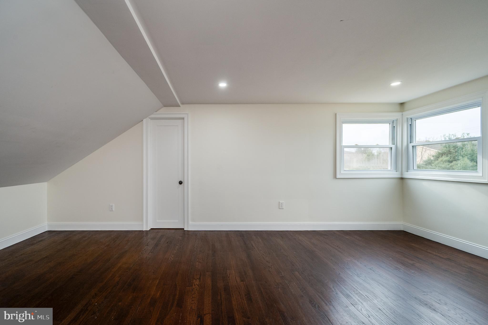 12 Vista Road Reading, PA 19610 - Photo 26 of 39 an empty room with wooden floor and windows